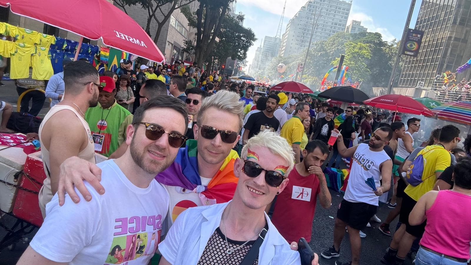 Panoramic view of a beach during Pride celebration
